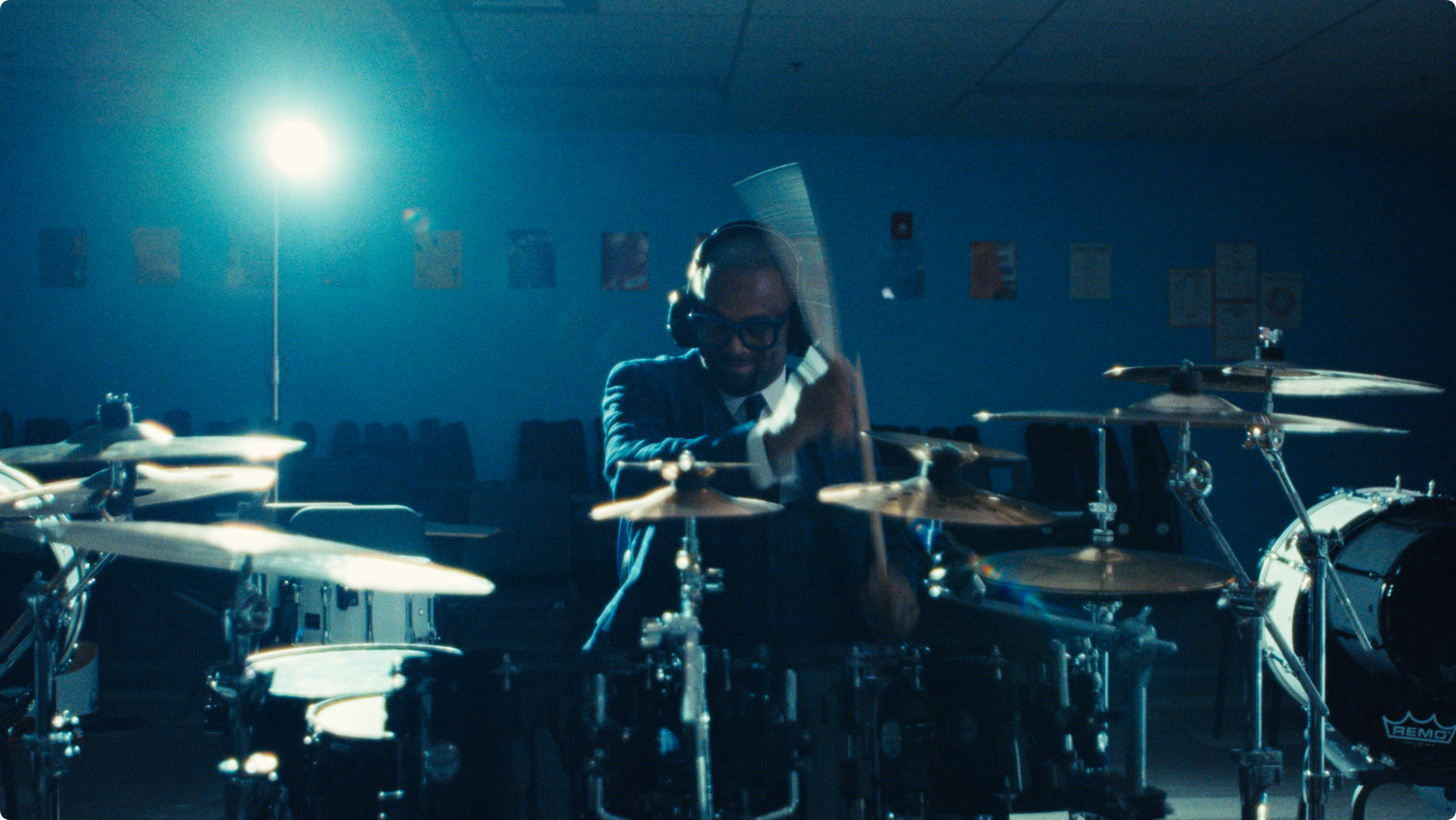 Drummer mid-performance.